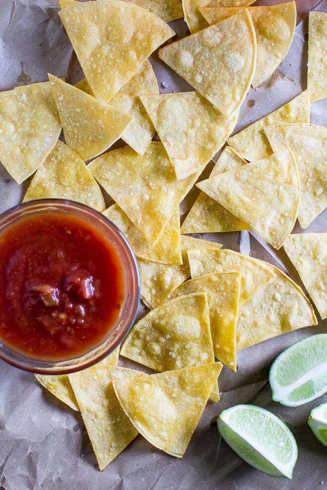 Bake your own Homemade Tortilla Chips in 10 minutes! Extra thin tortillas ensure crunchy snacks every time, perfect for salsa and guacamole.