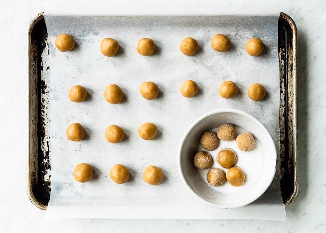 An easy Peanut Butter Blossoms cookie recipe. Soft, chewy peanut butter cookies are rolled in sugar, baked, and topped with a single Hershey's kiss!