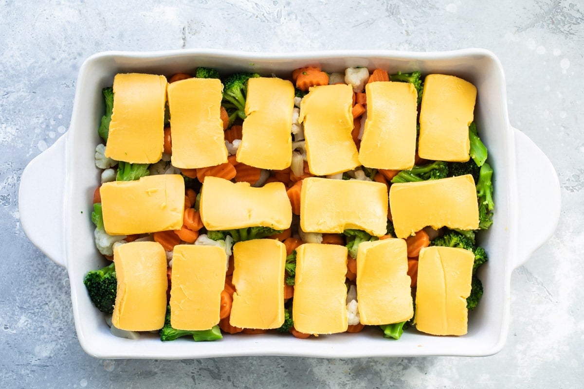 Frozen vegetables with velveeta on top.