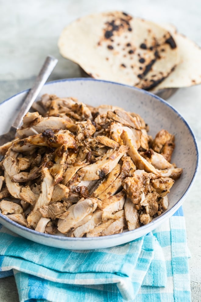 Chipotle chicken in a white serving bowl.