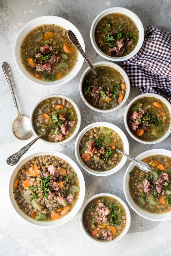 This Ham and Lentil Soup recipe is perfect for chilly weather and cooks up in about an hour; all you need is a loaf of French bread for a cozy winter’s feast. Put your leftover ham to work and make it on the stove, in a pressure cooker, or in your crockpot!