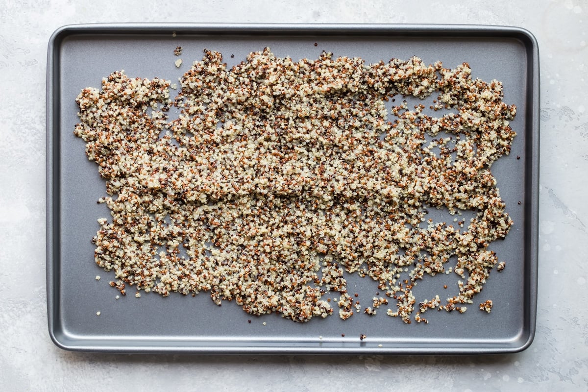 Quinoa on a baking sheet.