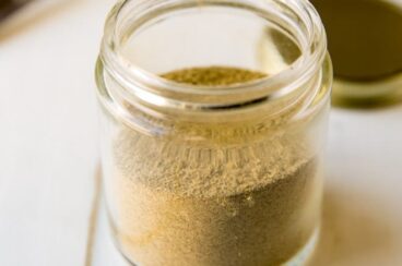 Homemade Poultry Seasoning recipe in a glass jar.