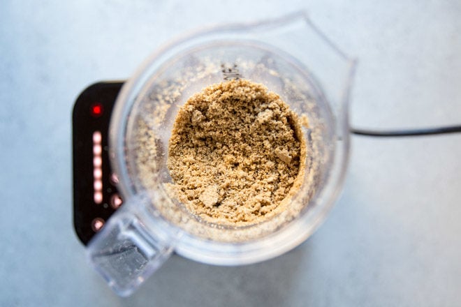 Sesame seeds being ground in a blender.