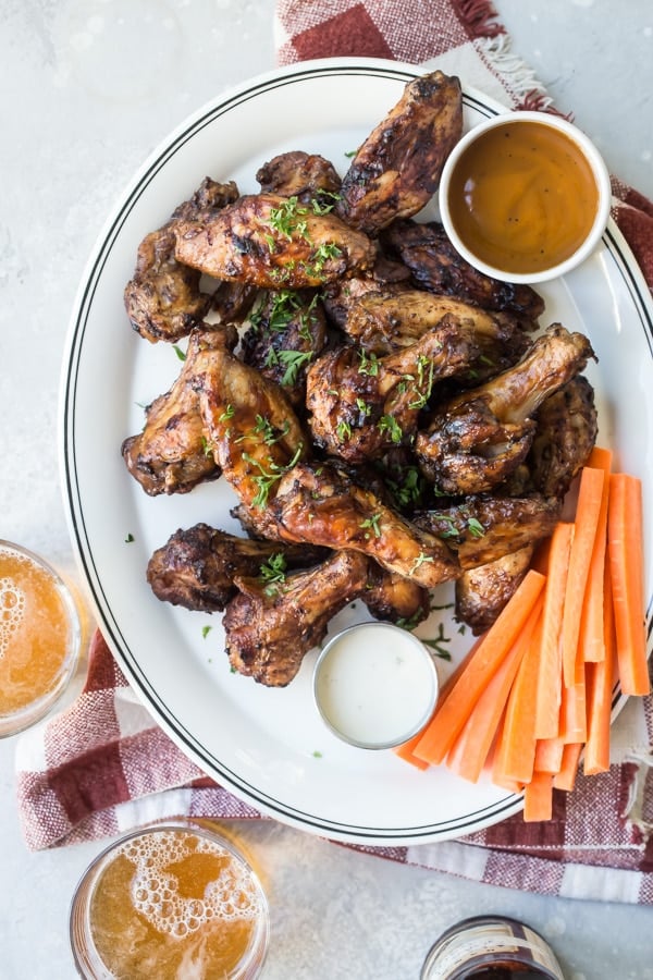 A summer barbecue recipe for Smoked Chicken Wings will take your wing game to new, spectacular heights. Fire up that charcoal smoker; here's everything you need to know to make the best chicken wings ever!
