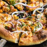 Bbq chicken skillet pizza on a pizza pan.