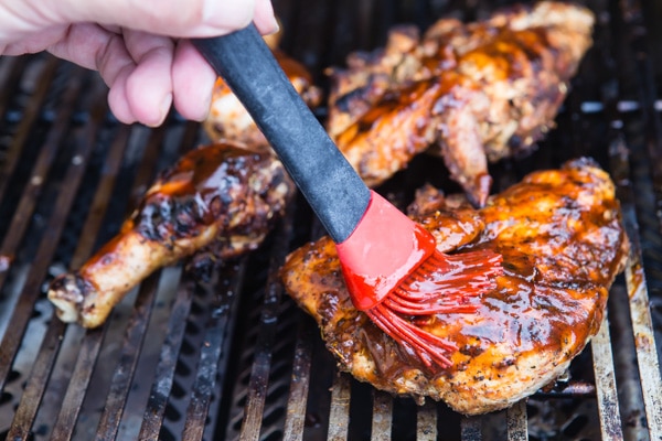 Barbecue chicken on a grill.