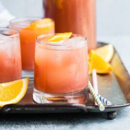 A new mother mocktail in glasses on a silver platter.