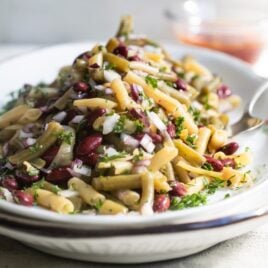 Three bean salad on a white platter.