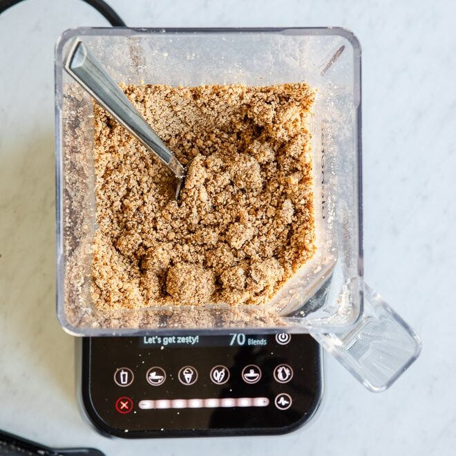 Pre-blended almond butter in a blender.