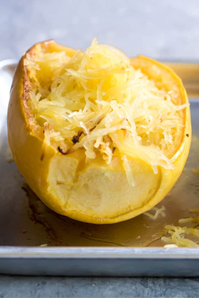 A half of a yellow squash, shredded.
