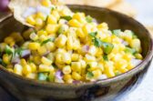 Chipotle corn salsa in a black bowl.