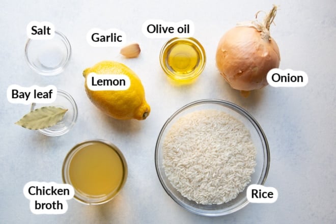 Labeled lemon rice pilaf ingredients in bowls.