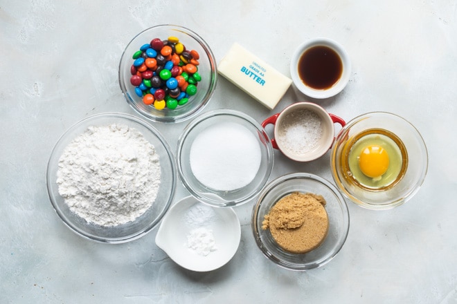 The ingredients portioned out for making M&M cookies.