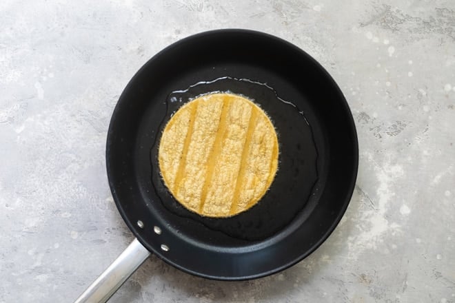 Make crispy taco shells or chips exactly once at home, and you’ll never go back to store-bought. They’re that good! Here’s how to fry tortillas, an easy technique I learned in Mexico, for the crunchiest, crackliest tacos, chips, and tostadas ever.