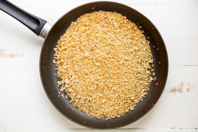 Breadcrumbs in a black skillet. 