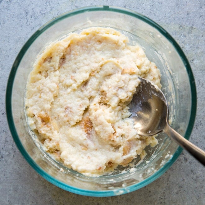 Panade in a clear bowl with a spoon. 