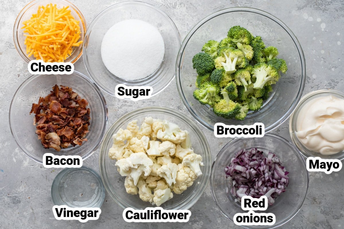 Labeled ingredients for broccoli salad with bacon and cheese.