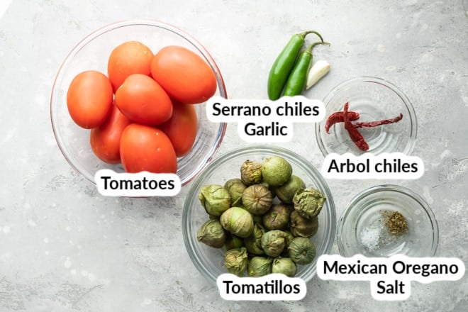 Salsa de Birrio ingredients in clear bowls.
