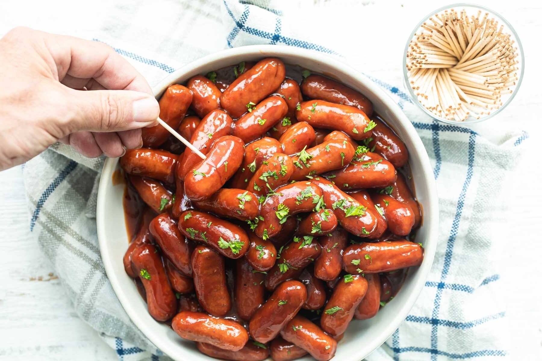 2 ingredient barbecue little smokies in a white bowl.