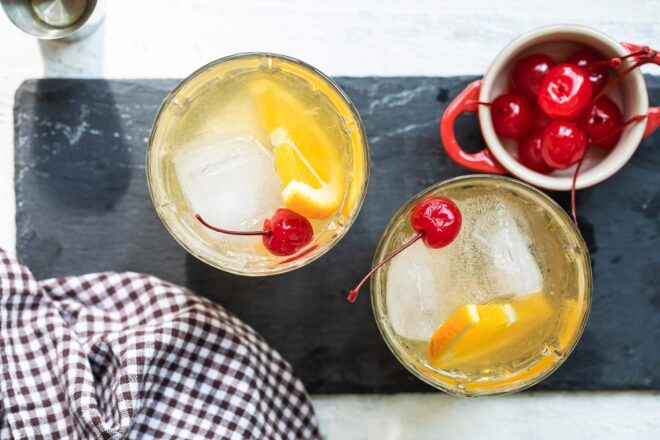 An amaretto sour cocktail in a clear glass.