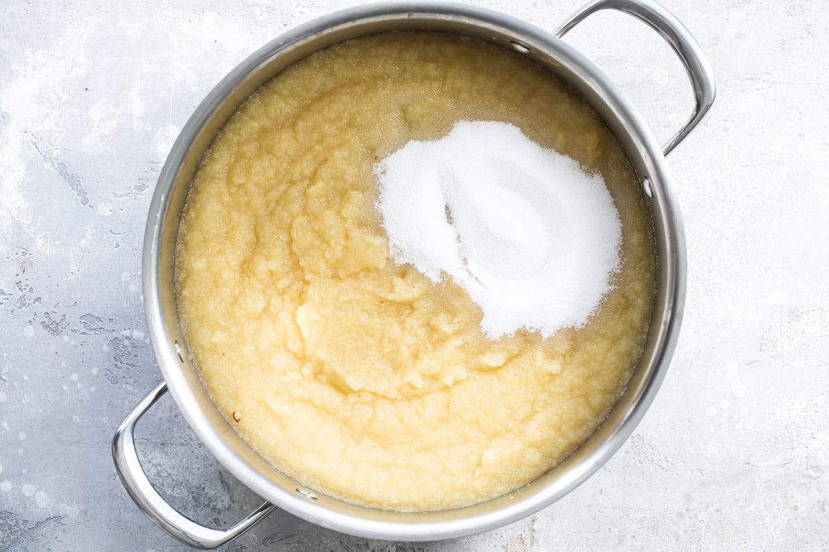 Applesauce in a silver stock pot.