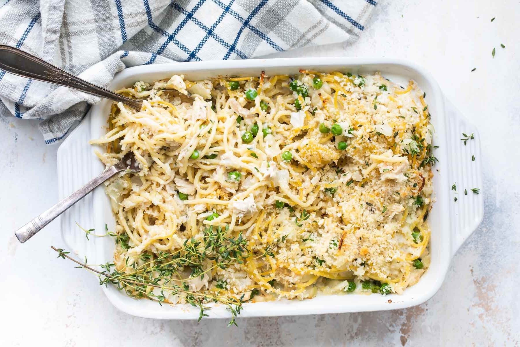 Chicken tetrazzini in a white baking dish.