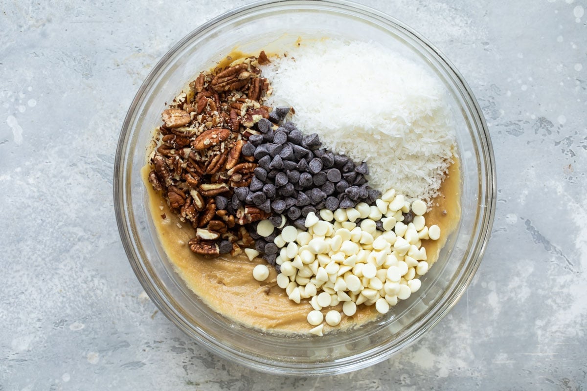 Congo bar ingredients in a silver bowl being mixed together.
