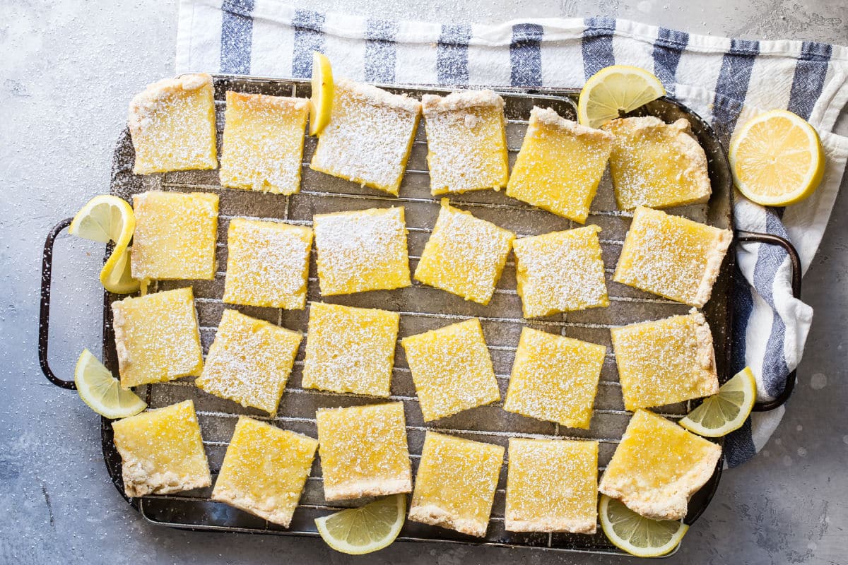 A pan of cut up lemon bars.