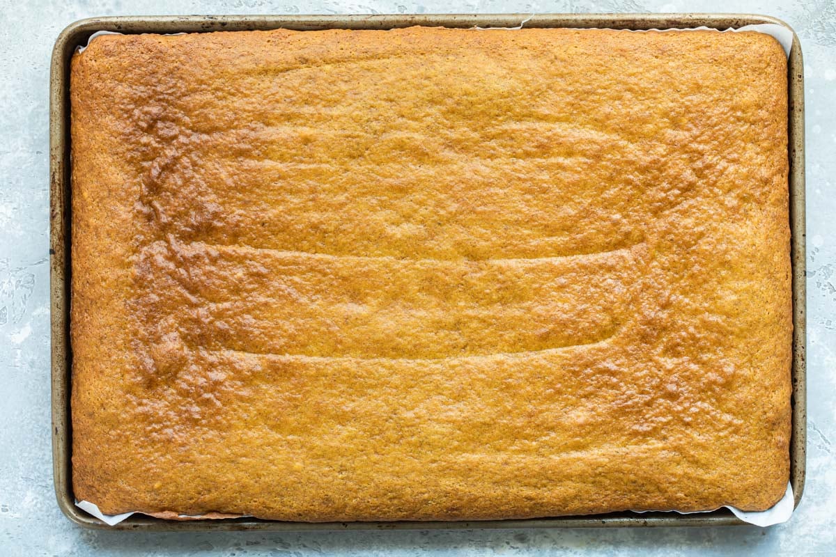 Baked pumpkin bars in a pan.