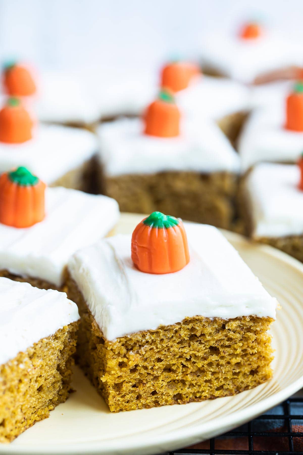 Pumpkin bars on a white plate.