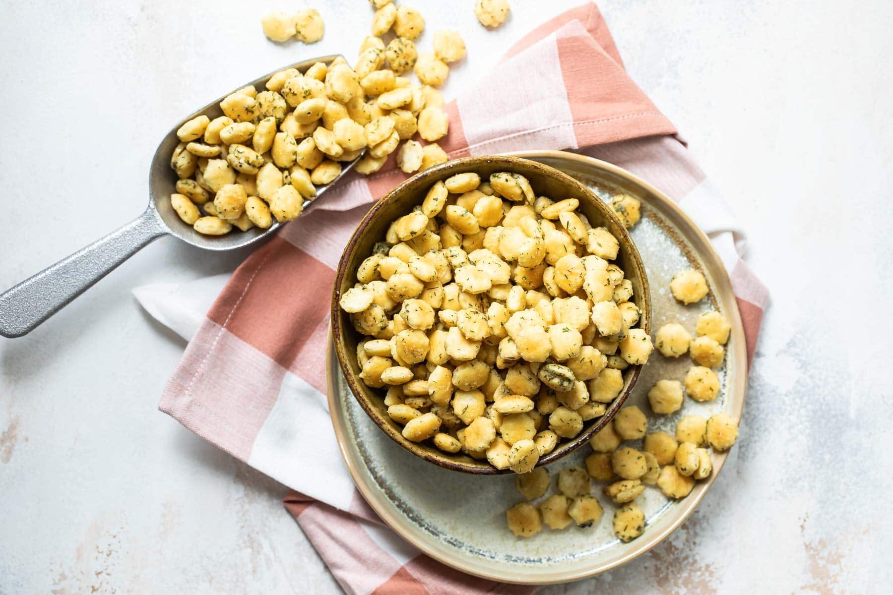 Ranch oyster crackers in a brown bowl.