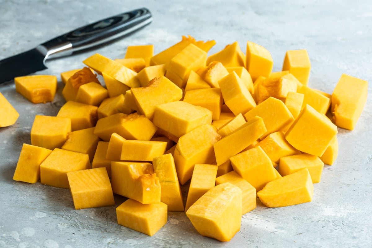 Raw butternut squash cut into cubes.