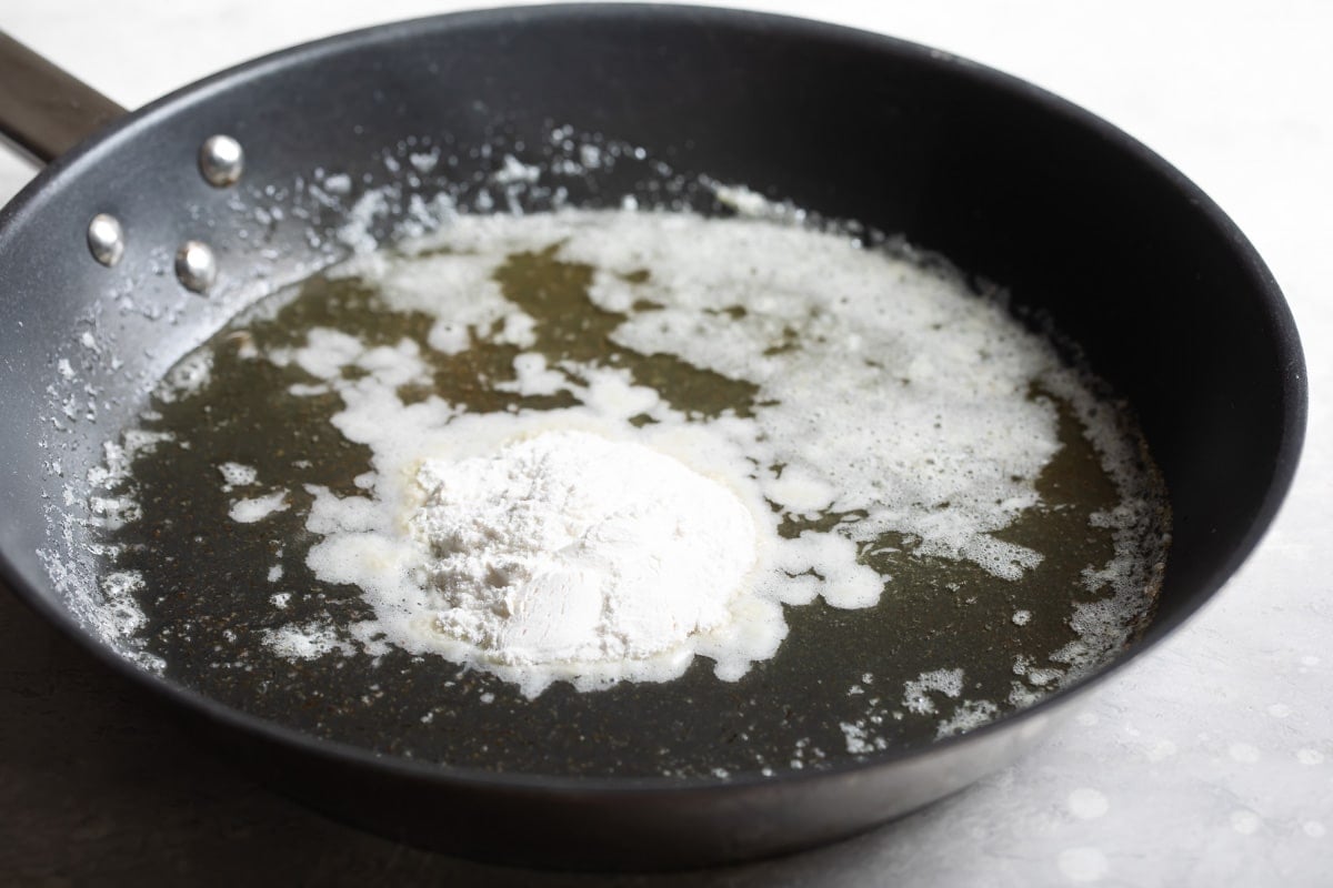 Flour added to butter in a pan to make roux.