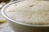 Dough in a bowl after proofing.