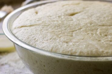 Dough in a bowl after proofing.