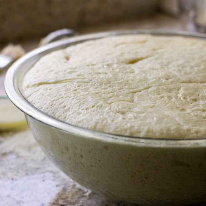 Dough in a bowl after proofing.