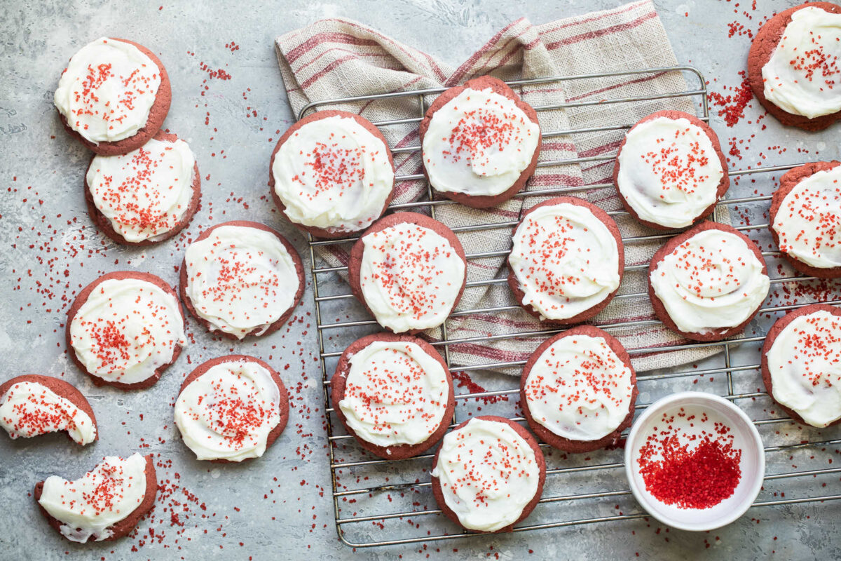 Red velvet cookies on a cooling rack.