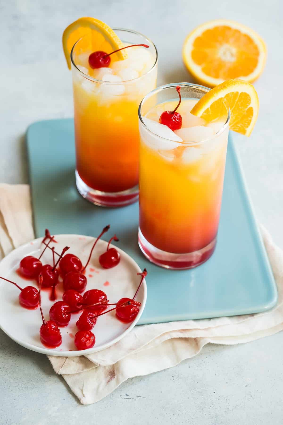 2 glasses of tequila sunrise.