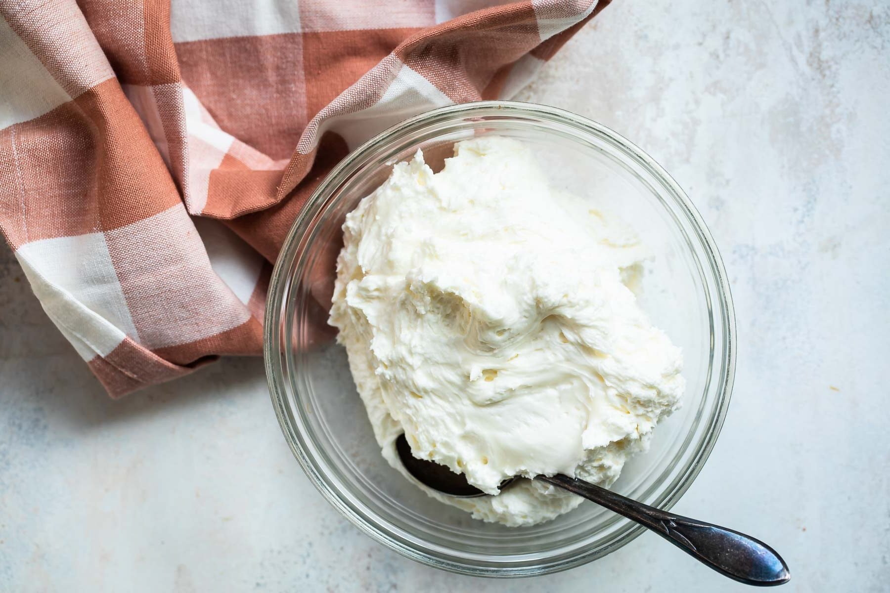 Buttercream frosting in a bowl.