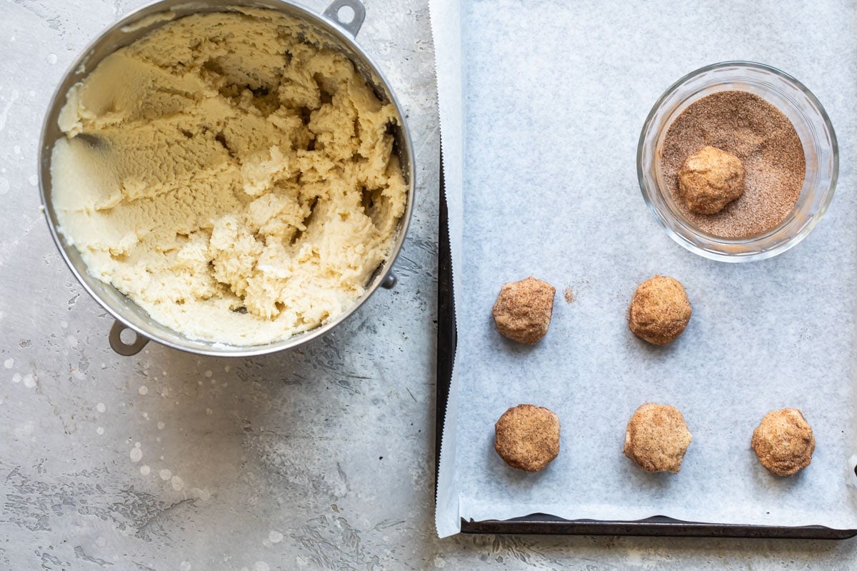 Snickerdoodle cookie dough on a baking sheet.