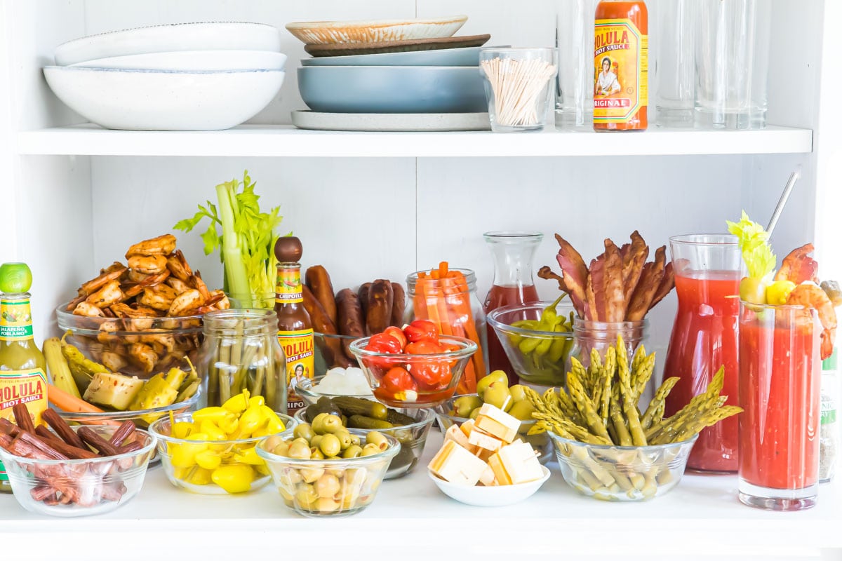 A bloody mary bar with all the garnishes.