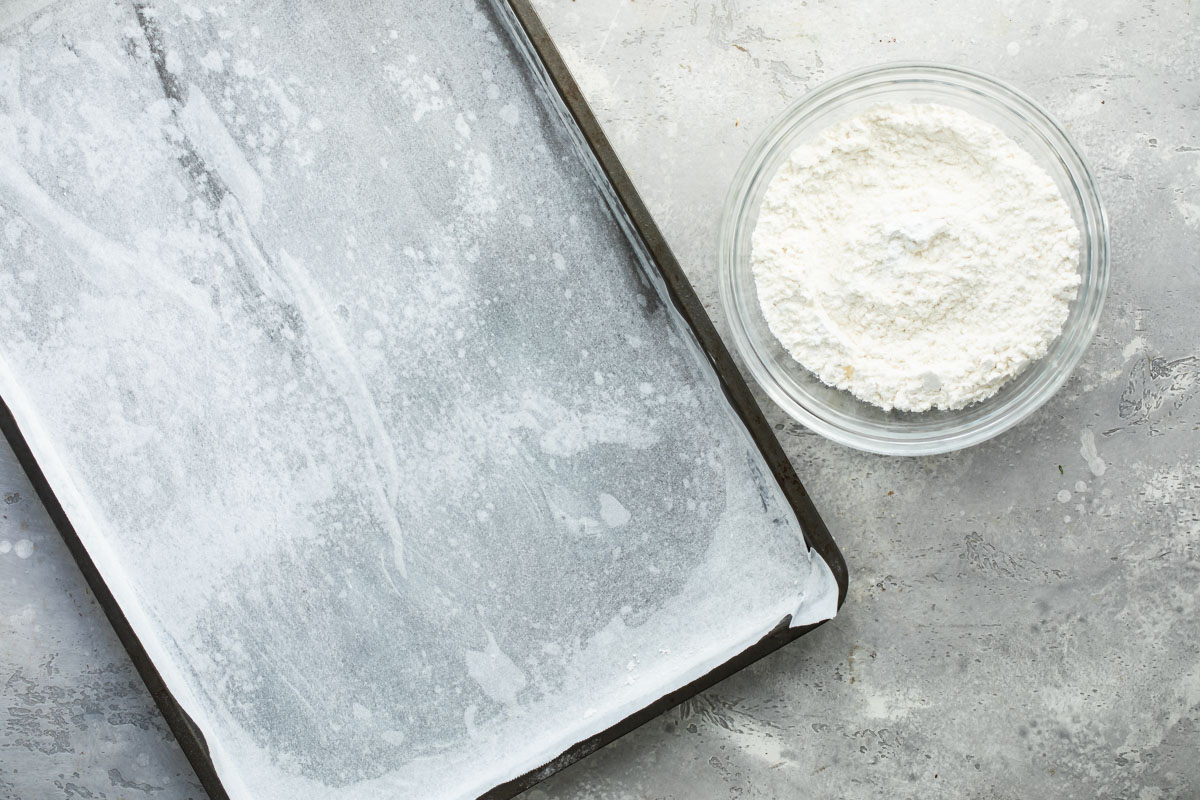 A baking sheet lined with parchment paper.