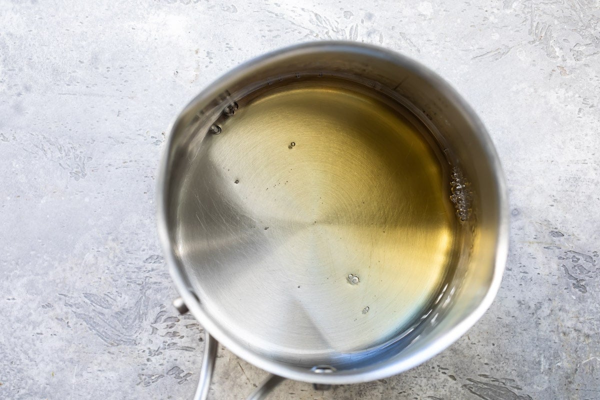 Simple syrup in a pan.