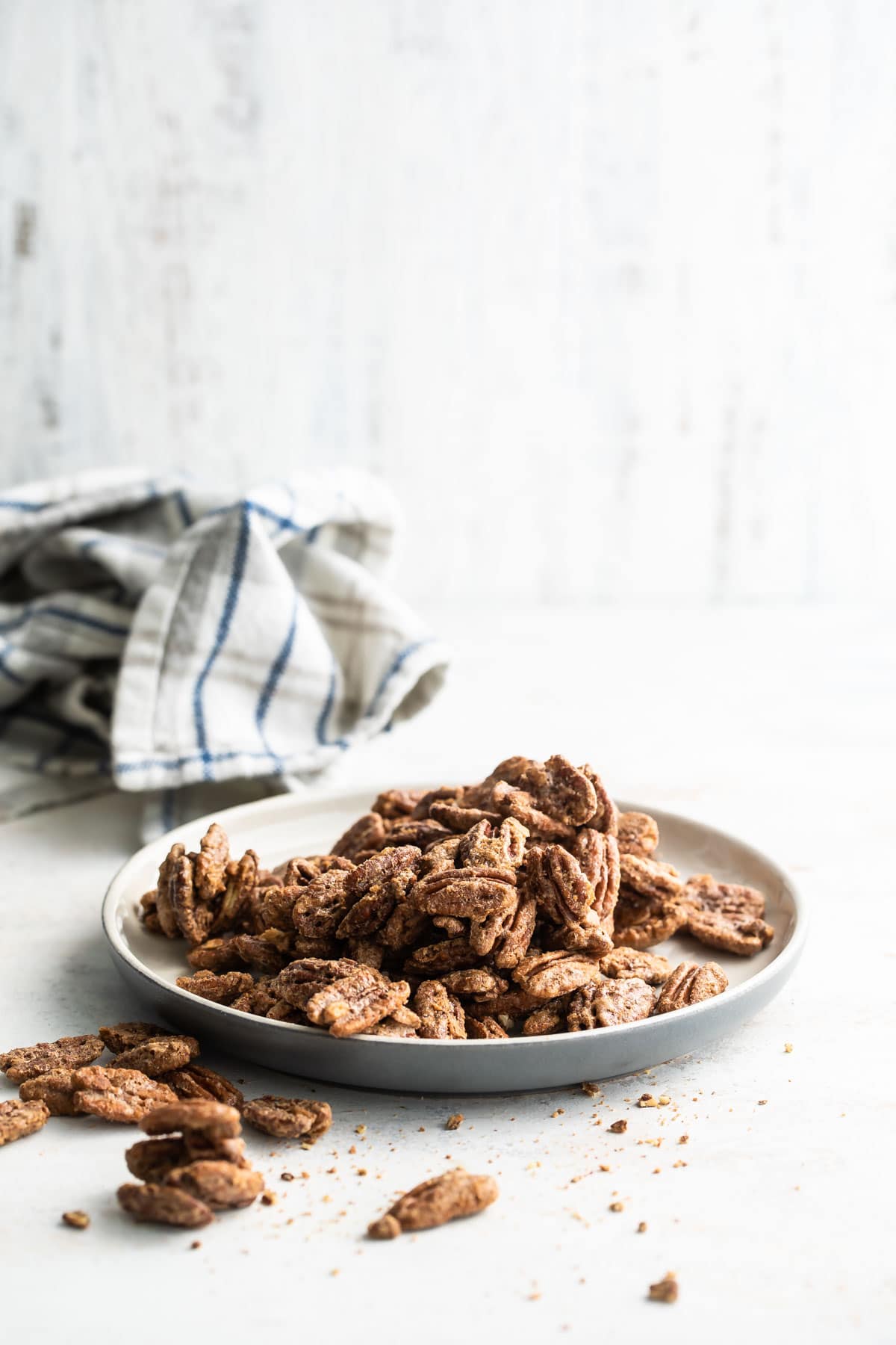 Candied pecans on a plate.