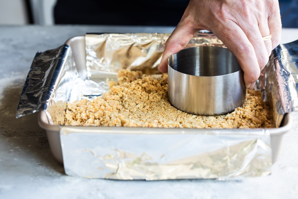Pressing graham cracker crumbs