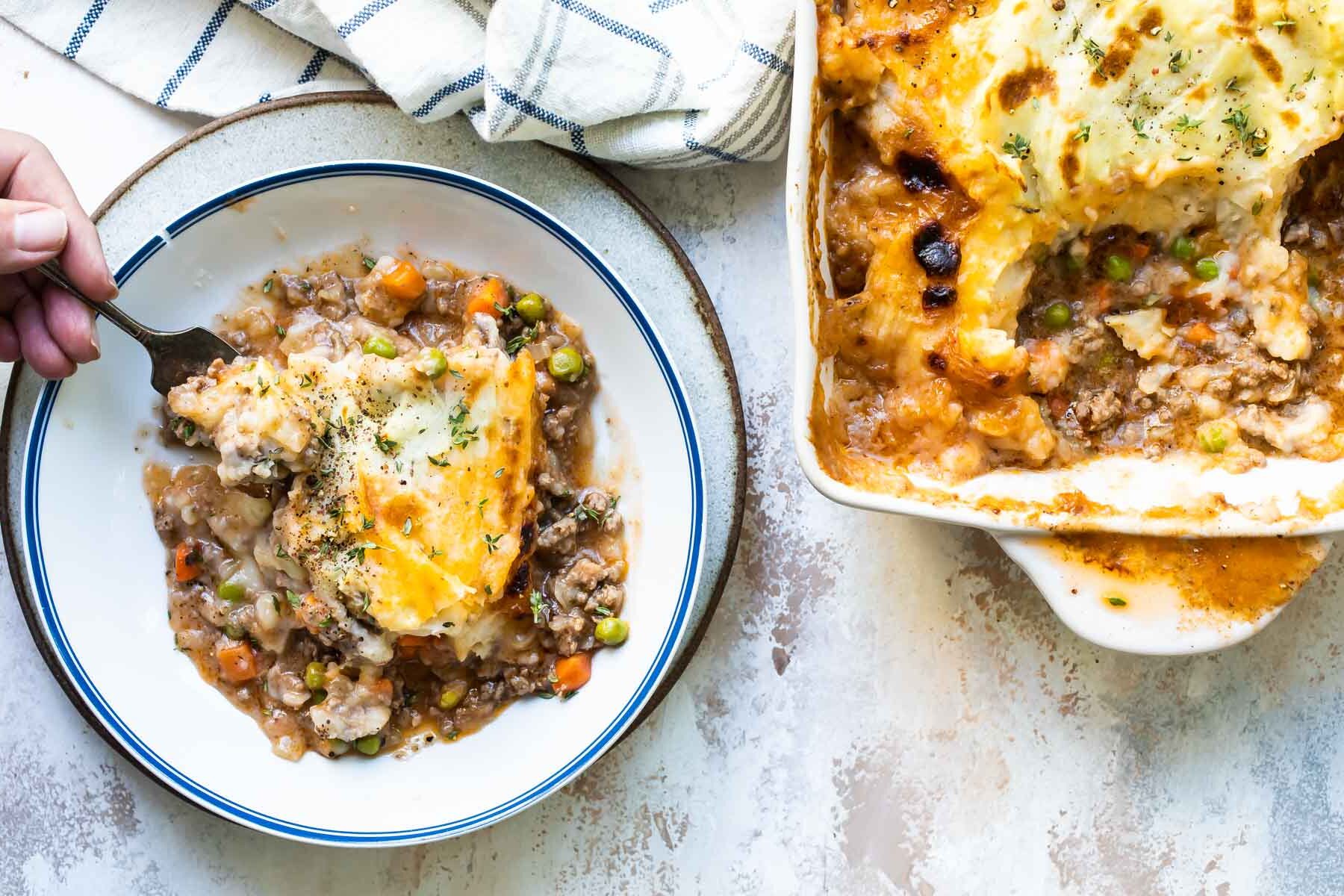 A slab of Shepherd's Pie in a bowl.