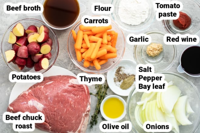 Pot roast ingredients labeled and in bowls.