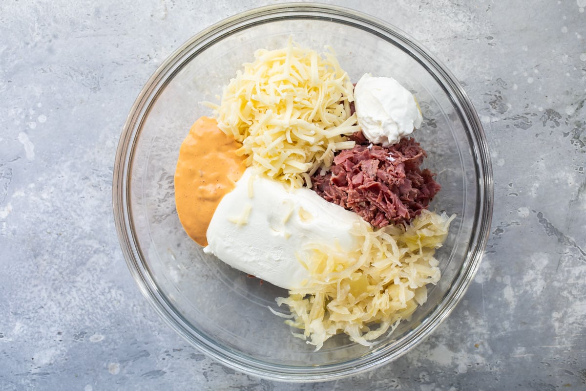 Hot reuben ingredients in a bowl.