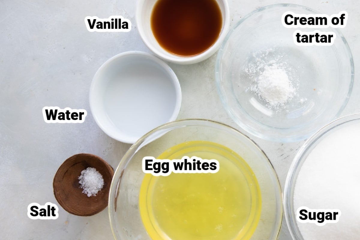 Meringue ingredients in bowls labeled.